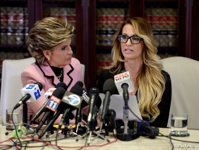 Jessica Drake speaks to reporters about allegations of sexual misconduct against Donald Trump, alongside lawyer Gloria Allred (L) during a news conference in Los Angeles, California, Oct. 22, 2016. Jessica Drake speaks to reporters about allegations of sexual misconduct against Donald Trump, alongside lawyer Gloria Allred (L) during a news conference in Los Angeles, California, Oct. 22, 2016.
